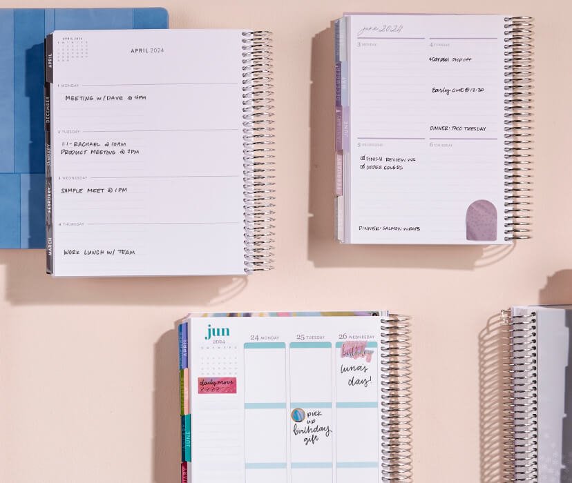 overhead view of assorted coiled weekly planners